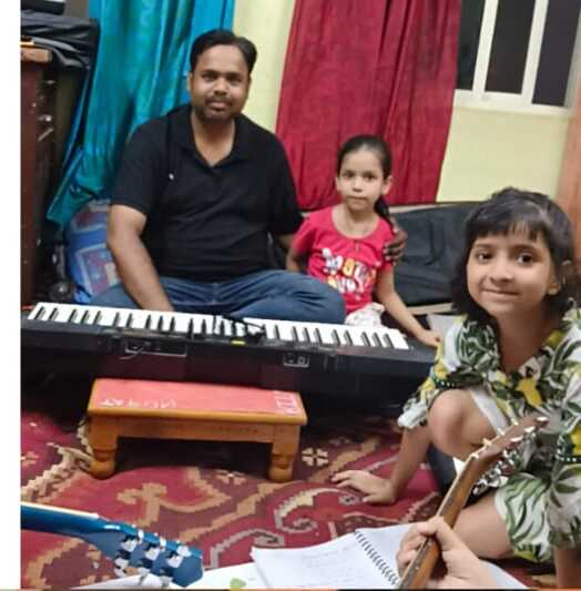 Music teacher taking a class at Natraj Sangeet Center